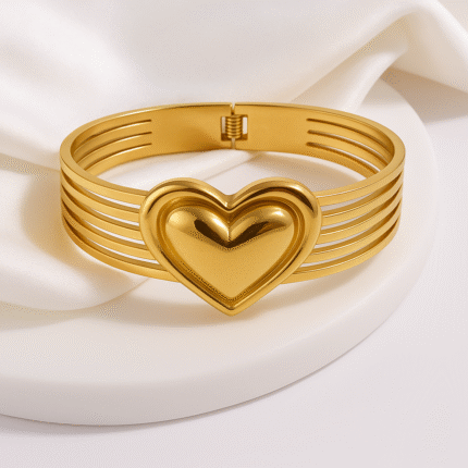 Heart Cuff Bracelet in gold, open adjustable bangle design with a heart motif. Anti tarnish and perfect for daily wear.